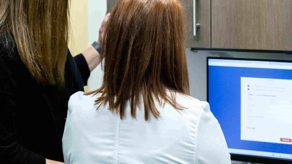 Two women on a computer